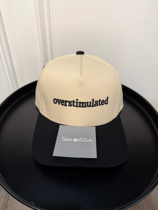 OVERSTIMULATED Letter Embroidered Two Tone Trucker Cap